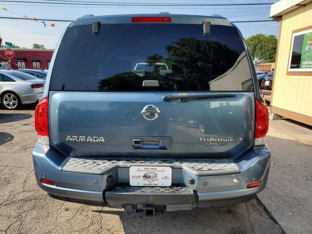 2010 Nissan Armada for sale at DAGO'S AUTO SALES LLC in Dalton, GA