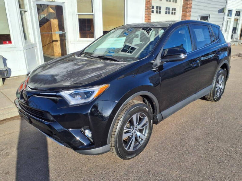 Used 2018 Toyota RAV4 XLE with VIN 2T3RFREV0JW798169 for sale in Sand Creek, WI