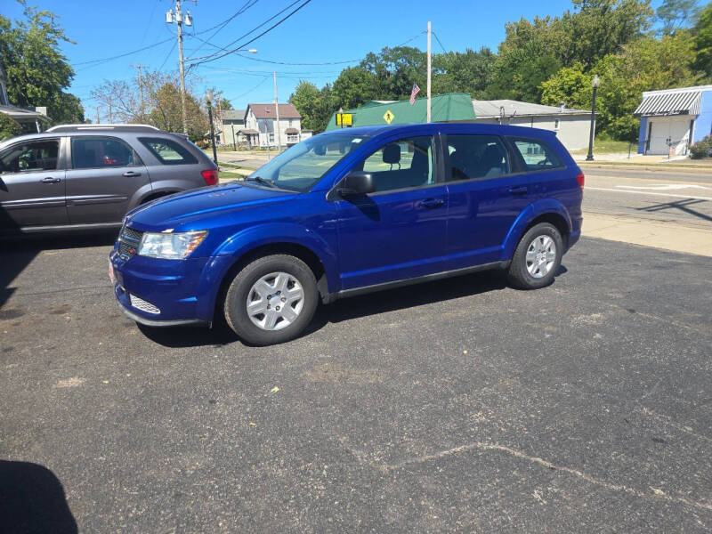 2012 Dodge Journey for sale at Maximum Auto Group II INC in Cortland OH