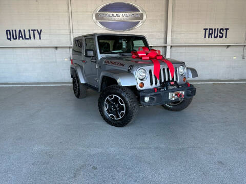 2013 Jeep Wrangler for sale at TANQUE VERDE MOTORS in Tucson AZ