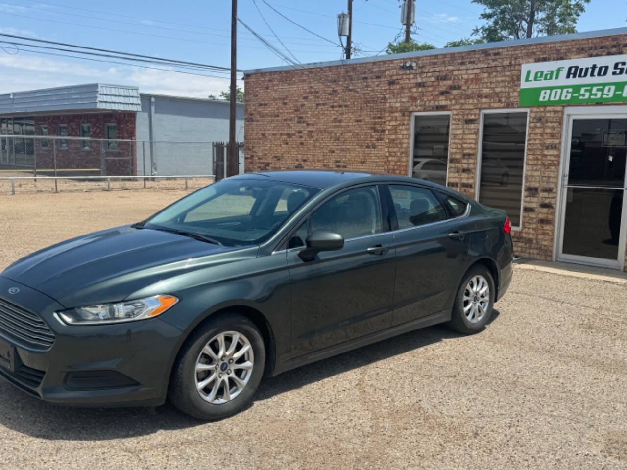 2015 Ford Fusion for sale at LEAF AUTO SALE LLC in Lubbock, TX