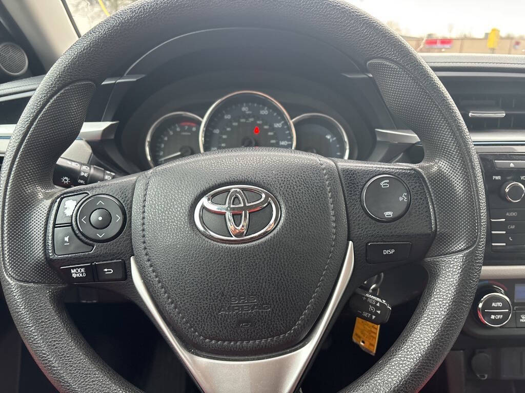 2015 Toyota Corolla for sale at DECKER AUTO SALES in Bay City, MI