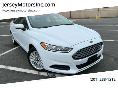 2014 Ford Fusion Hybrid for sale at JerseyMotorsInc.com in Hasbrouck Heights NJ