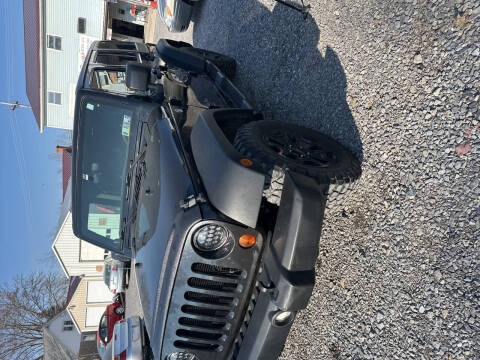 2013 Jeep Wrangler Unlimited for sale at DOUG'S USED CARS in East Freedom PA