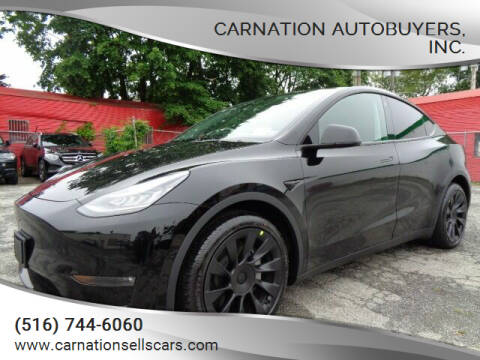 2021 Tesla Model Y for sale at CarNation AUTOBUYERS Inc. in Rockville Centre NY