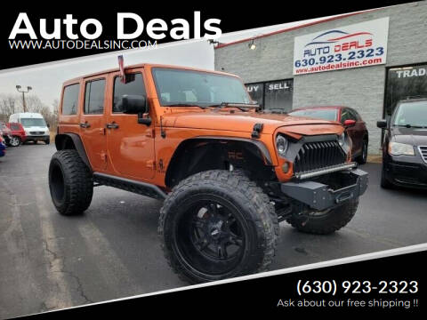 2011 Jeep Wrangler Unlimited for sale at Auto Deals in Roselle IL