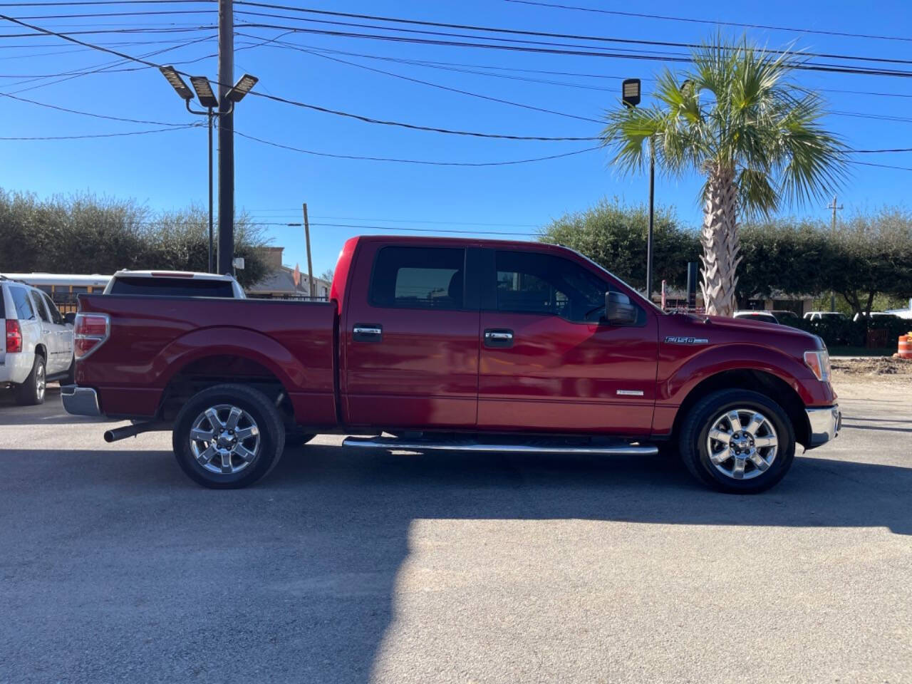 2014 Ford F-150 for sale at SMART CHOICE AUTO in Pasadena, TX