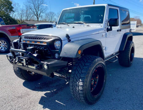 2014 Jeep Wrangler for sale at G. B. ENTERPRISES LLC in Crossville AL