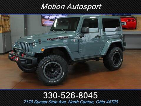 2014 Jeep Wrangler for sale at Motion Auto Sport in North Canton OH