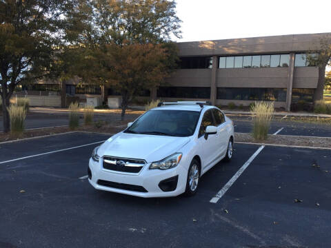 2013 Subaru Impreza for sale at QUEST MOTORS in Englewood CO