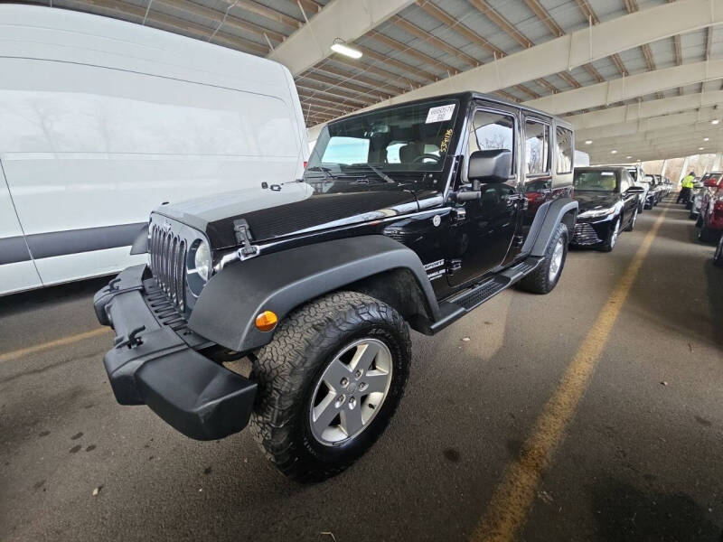 2015 Jeep Wrangler Unlimited for sale at Rinaldi Auto Sales Inc in Taylor PA