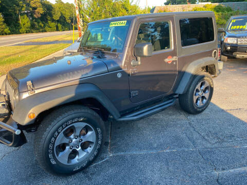 2014 Jeep Wrangler for sale at TOP OF THE LINE AUTO SALES in Fayetteville NC
