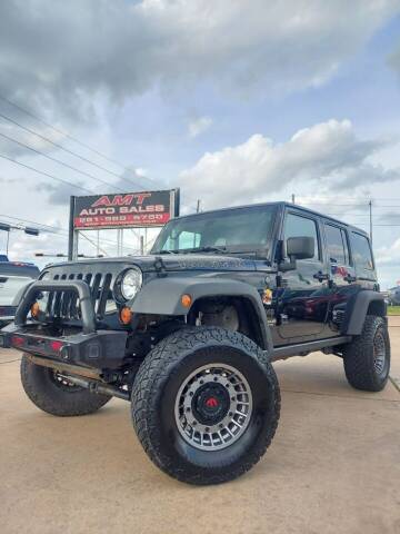 2012 Jeep Wrangler Unlimited for sale at AMT AUTO SALES LLC in Houston TX