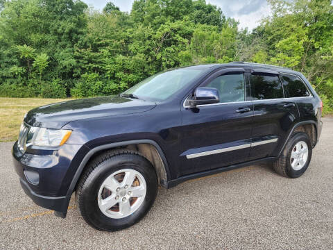 2011 Jeep Grand Cherokee for sale at Akron Auto Center in Akron OH