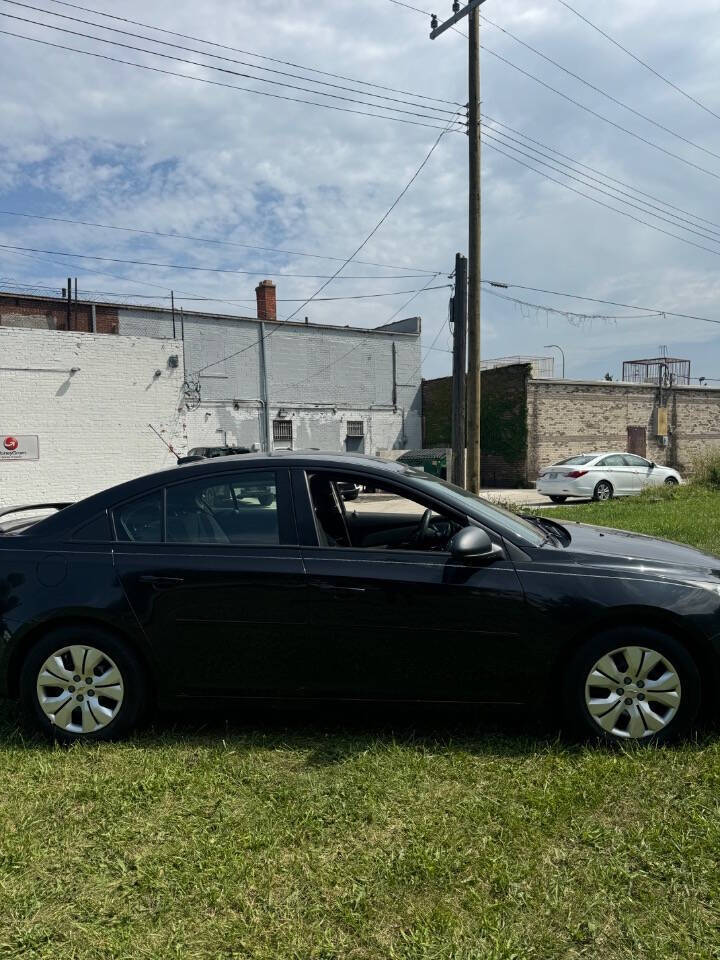 2015 Chevrolet Cruze for sale at H & H AUTO GROUP in Detroit, MI