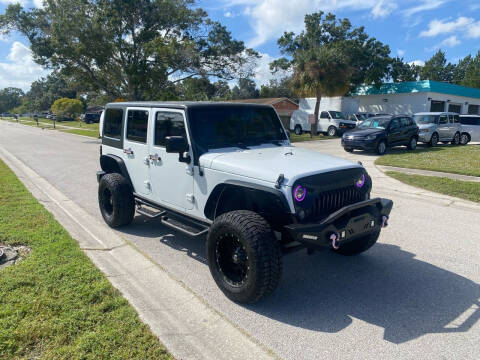 2014 Jeep Wrangler Unlimited for sale at Specialty Car and Truck in Largo FL