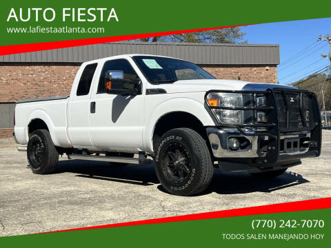 2014 Ford F-250 Super Duty for sale at AUTO FIESTA in Norcross GA