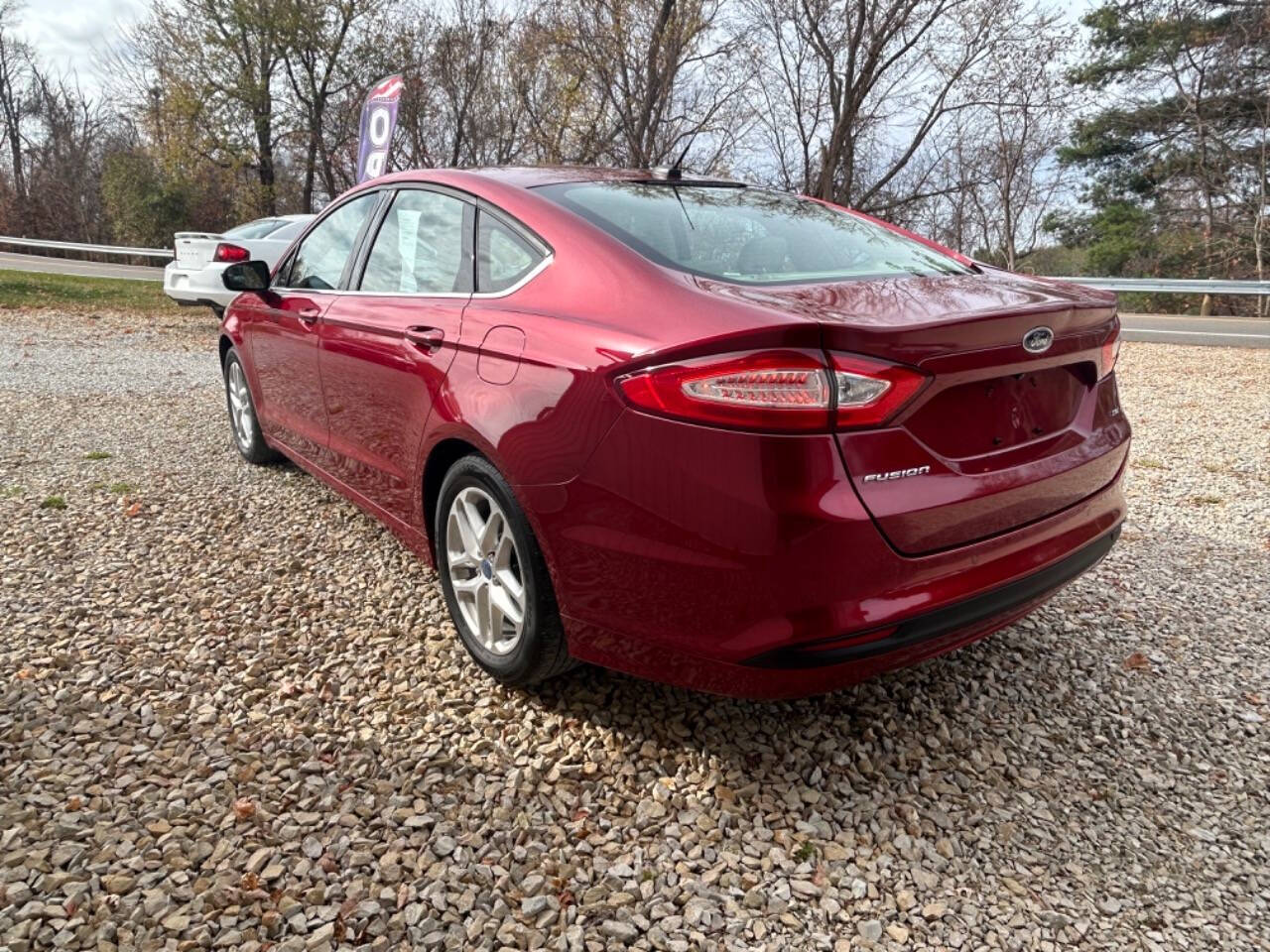 2014 Ford Fusion for sale at STRODES AUTO GROUP LLP in Malta, OH