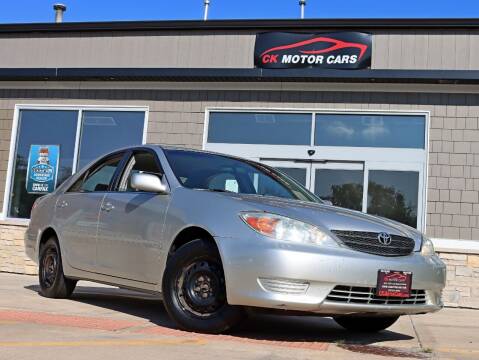 2004 Toyota Camry for sale at CK MOTOR CARS in Elgin IL