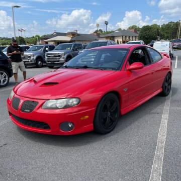 2006 Pontiac GTO for sale at DISTINCT AUTO GROUP LLC in Kent OH