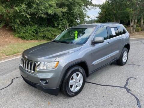 2012 Jeep Grand Cherokee for sale at CU Carfinders in Norcross GA