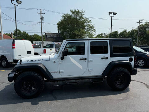 2015 Jeep Wrangler Unlimited for sale at Aurora Auto Center Inc in Aurora IL