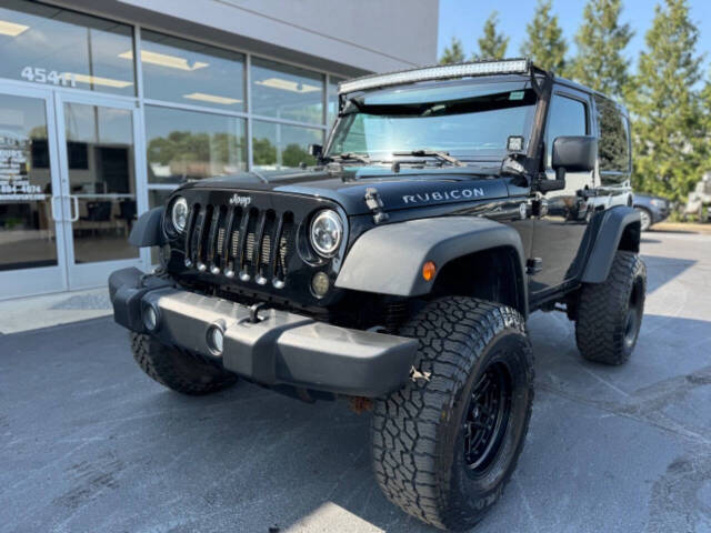 2012 Jeep Wrangler for sale at Opus Motorcars in Utica, MI