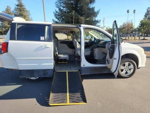2014 Dodge Grand Caravan for sale at Empire Motors in Acton CA