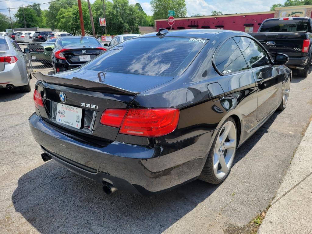 2011 BMW 3 Series for sale at DAGO'S AUTO SALES LLC in Dalton, GA