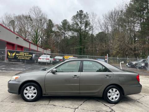 2003 Toyota Camry for sale at Legacy Motor Sales in Norcross GA