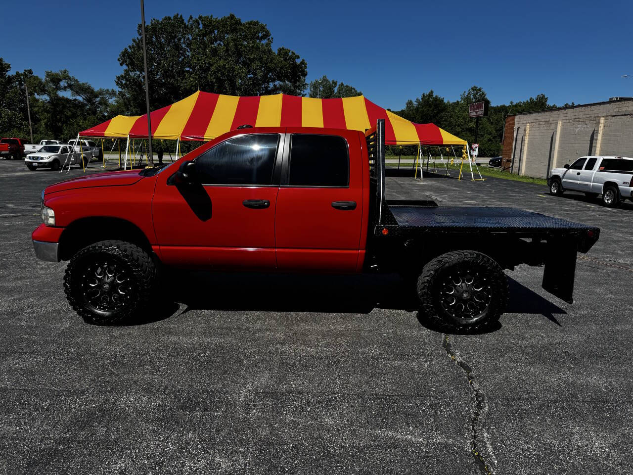 Red 2003 Dodge Ram 2500 SLT 4dr Quad Cab SLT 4WD SB 2