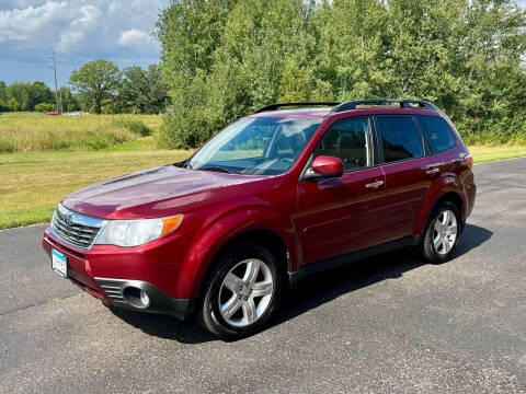 2009 Subaru Forester for sale at AM AUTOMOTIVE in Forest Lake MN