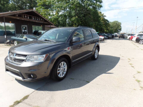 2014 Dodge Journey for sale at Jims Auto Sales in Muskegon MI