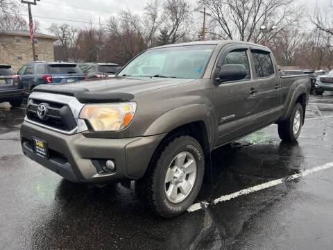 2013 Toyota Tacoma for sale at Chinos Auto Sales in Crystal MN