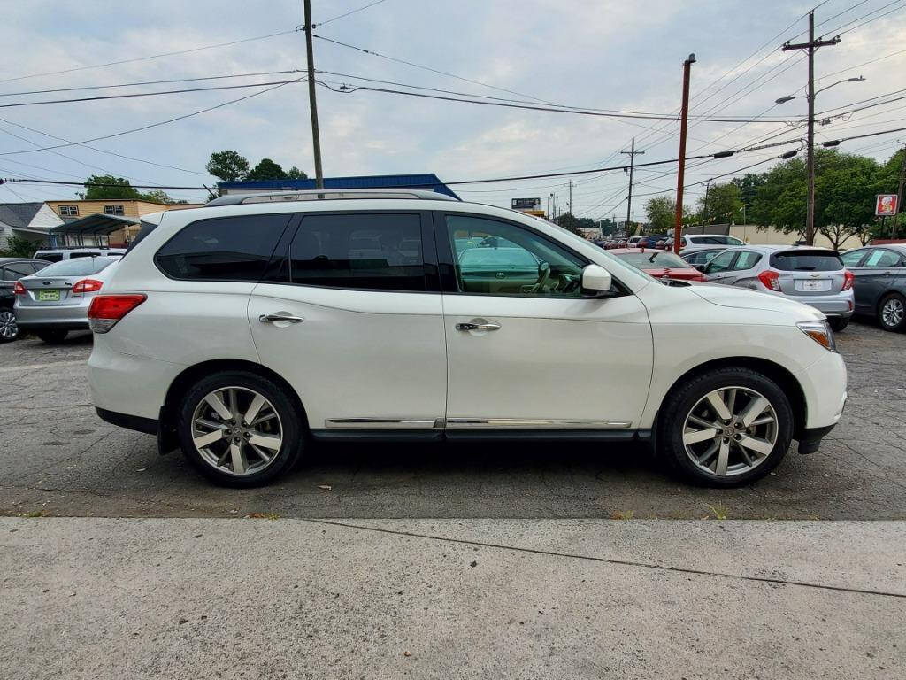 2014 Nissan Pathfinder for sale at DAGO'S AUTO SALES LLC in Dalton, GA