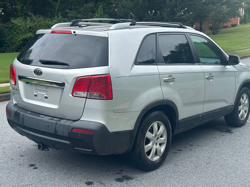 2012 Kia Sorento for sale at SHURE AUTO SALES in Snellville, GA