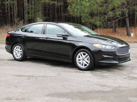 2015 Ford Fusion for sale at Hometown Auto Sales - Cars in Jasper AL