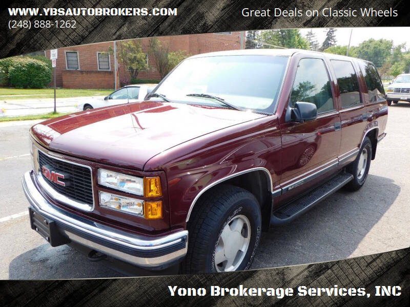 1999 GMC Yukon for sale at Farmington's Finest Used Autos - Yono Brokerage Services, INC in Farmington MI