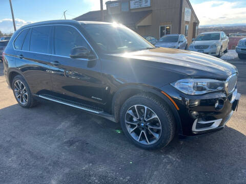 2017 BMW X5 for sale at BERKENKOTTER MOTORS in Brighton CO