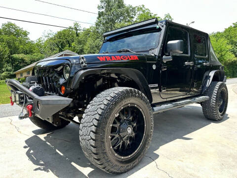 2012 Jeep Wrangler Unlimited for sale at Cobb Luxury Cars in Marietta GA