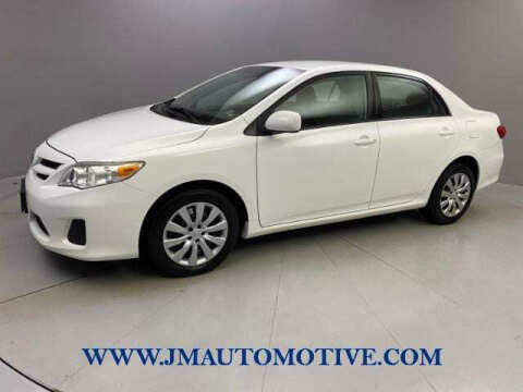 2012 Toyota Corolla for sale at J & M Automotive in Naugatuck CT