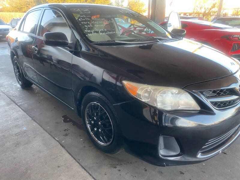 2013 Toyota Corolla for sale at Buy-Fast Autos in Houston TX