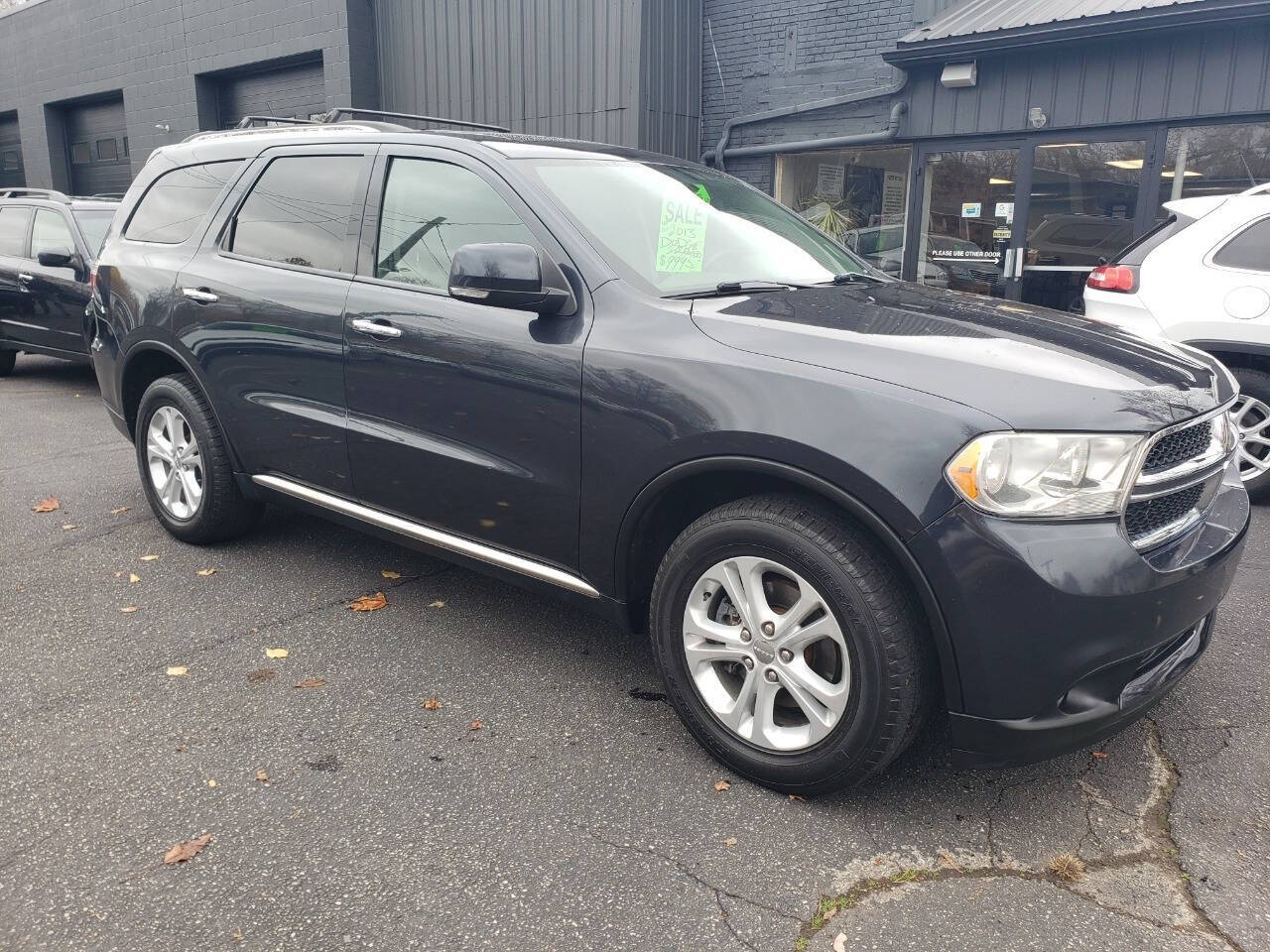 2013 Dodge Durango for sale at Auto Shop in Wyoming, MI