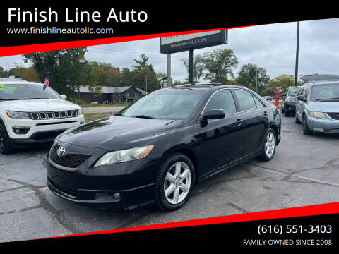 2009 Toyota Camry for sale at Finish Line Auto in Comstock Park MI