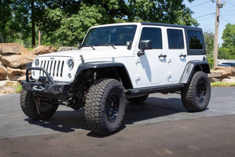 2014 Jeep Wrangler Unlimited for sale at CROSSROAD MOTORS in Caseyville IL