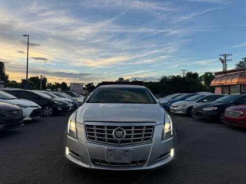 2013 Cadillac XTS for sale at SANAA AUTO SALES LLC in Englewood CO