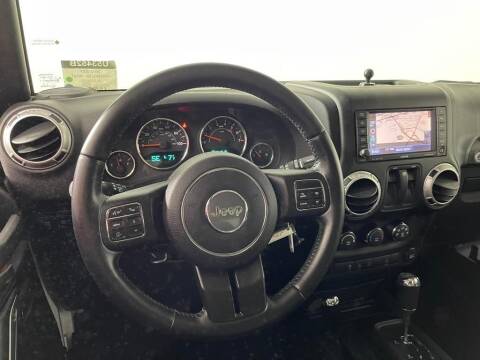 2015 Jeep Wrangler for sale at CU Carfinders in Norcross GA