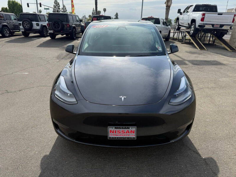Used 2024 Tesla Model Y Long Range with VIN 7SAYGDEEXRF079804 for sale in Bakersfield, CA