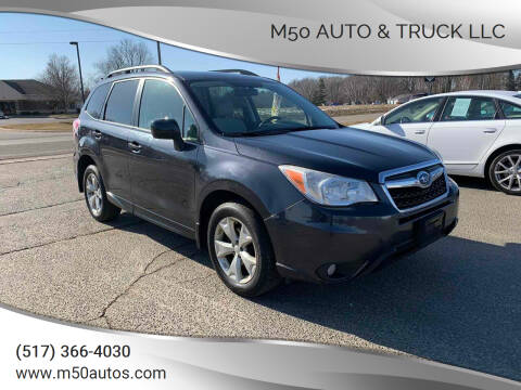 2014 Subaru Forester for sale at Icon Auto Group in Lake Odessa MI