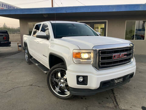 2014 GMC Sierra 1500 for sale at AUTO NATIX in Tulare CA